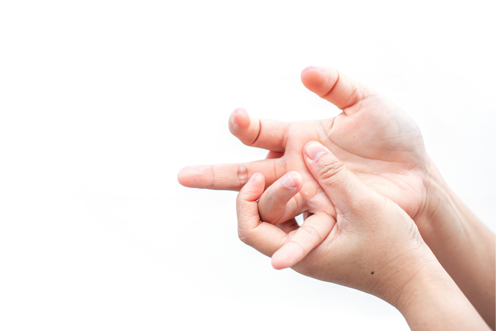 Mãos com um dedo em gatilho ou tenossinovite estenosante